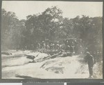 Carriers crossing a river, Cabo Delgado, Mozambique, April-July 1918