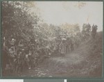 Carriers crossing a stream, Cabo Delgado, Mozambique, August 1918